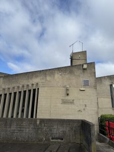The wall of Dunelm House showing the bust of Sir Over Arup